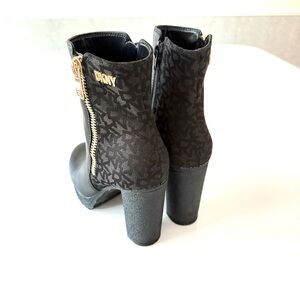 DKNY Logo Black Ankle Boots with Gold Accents and Side Zippers